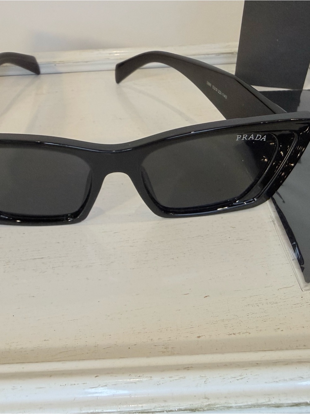 Prada Glossy Black Slim Cat-Eye Sunglasses - Picture 6 of 6